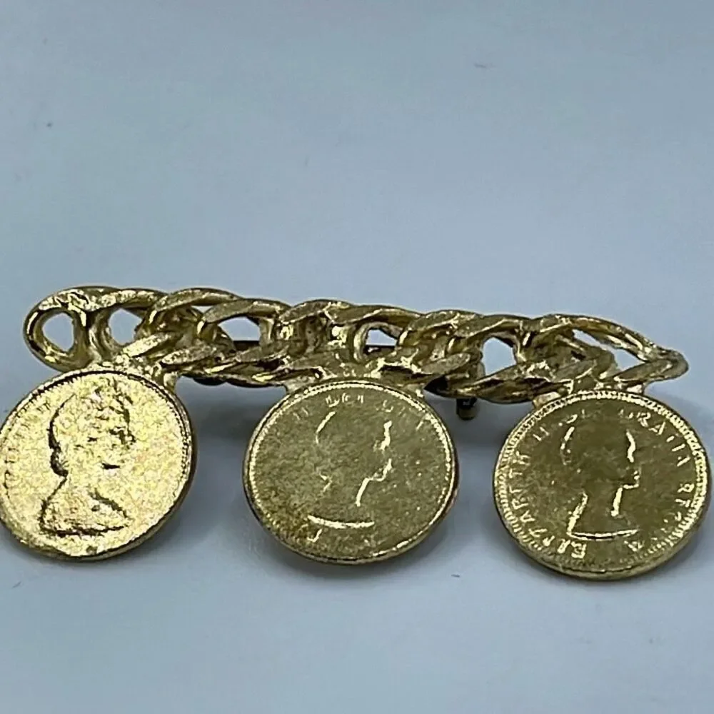 Vintage chain link  Elizabeth II faux coin brooch.